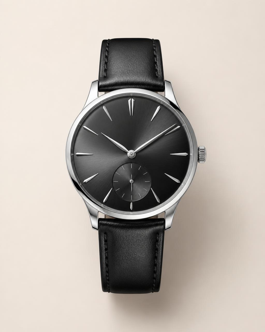 The Ascendant, a steel watch with a charcoal sunburst dial